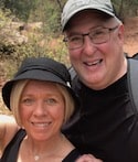 Kim and Phil from CooWooDoo smiling and wearing sun hats in Colorado