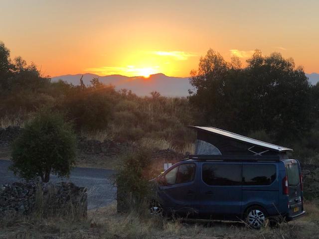 sunrise over campervan