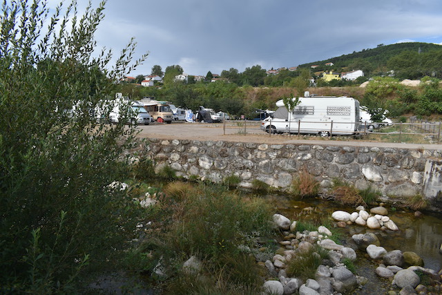 campervans parked up by river