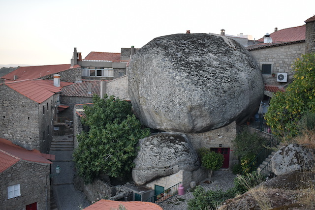 house with boulder as a roof